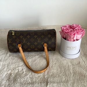 Authentic Louis Vuitton Monogram Papillon handbag with gold tone hardware.